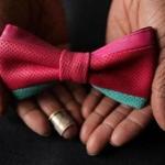 Christopher Chaun Bennett makes high-end bow ties in the bedroom of his apartment.