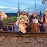 Seattle Raging Grannies members sat chained together on BNSF Railway tracks near two refineries in Washington state.