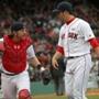 BOSTON, MA - MAY 15: Junichi Tazawa #36 of the Boston Red Sox reacts with Ryan Hanigan #10 after he pitched a scoreless eighth inning against the Houston Astros at Fenway Park on May 15, 2016 in Boston, Massachusetts. (Photo by Jim Rogash/Getty Images)