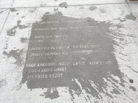 Water-repellent spray wears off in six to eight weeks, allowing poems to become visible when it rains.
