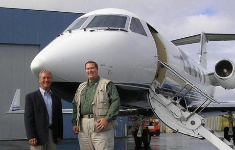 Mark Avery (right) posed with Joe Kapper at Security Aviation Inc. in Anchorage.
