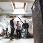 The Lamplighter team: cofounders AC Jones and Cayla Marvil with head brewer Tyler Fitzpatrick. 