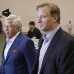 NFL Commissioner Roger Goodell, foreground, and New England Patriots owner Robert Kraft walk onto the field as they arrive at a football safety clinic for mothers, Thursday, May 29, 2014 at the team's facilities in Foxborough, Mass. (AP Photo/Stephan Savoia)