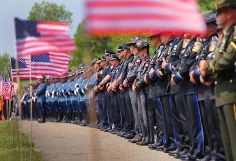 Charlton -5/27/16- A funeral service was held at St. Joseph's Catholic Church for Auburn Police officer Ronald Tarentino Jr. who was shot and killed last weekend. Police from all over New England line the front of the church. Boston Globe staff Photo by John Tlumacki (metro)
