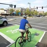 A ?bike box? in Brookline gives cyclists more room at traffic lights. 