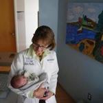 Dr. Sharon F. Daley, chief of pediatrics at Cape Cod Hospital, held a baby being treated for symptoms of withdrawal.