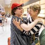 Long time pen pals Carole Lechan,(left) of Natick, and Jane Anderson, of New Zealand, finally met face-to-face at Logan Airport this week.