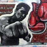 A mural of Muhammad Ali appeared in Cambridge over the weekend.