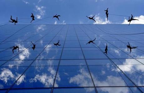 The vertical dance group Bandaloop rehearsed its creative moves from the 17th floor of the new building on 100 Northern Ave. on Tuesday.
