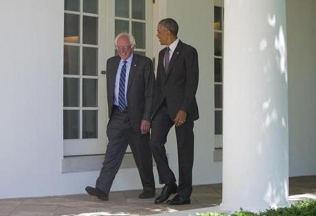  President Barack Obama walks with Democratic presidential candidate Sen. Bernie Sanders, I-Vt., down the Colonnade of the White House in Washington, Thursday, June 9, 2016. (AP Photo/Pablo Martinez Monsivais)
