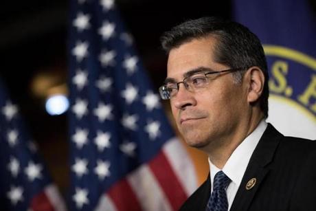 WASHINGTON, DC - MAY 11: Rep. Xavier Becerra (D-CA) listens during a news conference to discuss the rhetoric of presidential candidate Donald Trump, at the U.S. Capitol, May 11, 2016, in Washington, DC. Donald Trump is scheduled to meet with Speaker of the House Paul Ryan on Thursday near Capitol Hill. (Photo by Drew Angerer/Getty Images)
