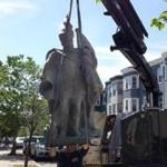 The statue of St. Florian is placed outside of Father Dan Mahoney?s church in Charlestown. 