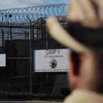The defense spending bill passed by the US Senate would bar closure of the detention facility at Guantanamo Bay, Cuba.