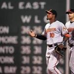 Adam Jones (10), Nolan Reimold and the Orioles moved into first place Tuesday with a 3-2 victory over the Red Sox.
