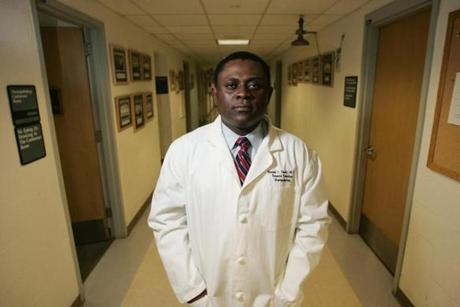 FILE â?? Dr. Bennet Omalu, who identified a degenerative brain disease linked to repeated head hits, at the University of Pittsburgh Medical Center Presbyterian Hospital in Pittsburgh, Jan. 2007. Will Smith portrays Omalu in the film â??Concussion.â?? In dozens of emails unearthed by hackers, Sony Pictures executives and others discussed altering the script and marketing the movie more as a whistle blower story than as a condemnation of the NFL. (Lisa Renee Kyle/The New York Times)
