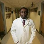 FILE â?? Dr. Bennet Omalu, who identified a degenerative brain disease linked to repeated head hits, at the University of Pittsburgh Medical Center Presbyterian Hospital in Pittsburgh, Jan. 2007. Will Smith portrays Omalu in the film â??Concussion.â?? In dozens of emails unearthed by hackers, Sony Pictures executives and others discussed altering the script and marketing the movie more as a whistle blower story than as a condemnation of the NFL. (Lisa Renee Kyle/The New York Times)