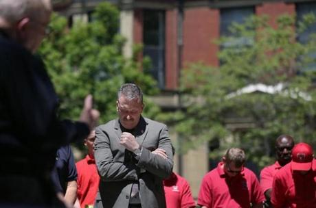 Boston Fire Department Commissioner Joseph E. Finn bowed his head during the annual memorial ceremony for the nine firefighters that lost their lives in the 1972 Hotel Vendome fire. 
