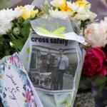 Flowers and tributes were left in Birstall, England. 