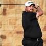 Ireland?s Shane Lowry hits his tee shot on the ninth hole during the third round of the US Open. 