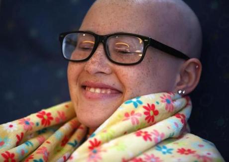 Carlie Gonzalez, 15, who has Ewing?s sarcoma, reacted to the reflexology being performed on her feet.
