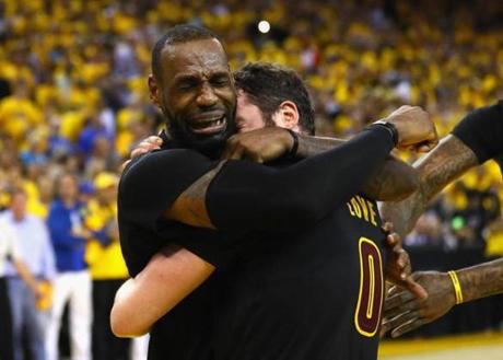 An emotional LeBron James embraced teammate Kevin Love after the Cavaliers clinched their first NBA championship.
