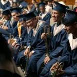 Senior trumpet player Michael Diaz, second from right, and other graduating band members prepared to perform an arrangement of 