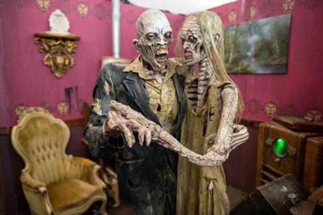 A happy couple at Spooky World in Litchfield, N.H. An imaginative entrepreneur wants to turn Castle Island into a ?Spooky World?-style freak show this fall, complete with full-fledged zombie attacks. 
