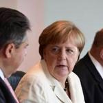 (LtoR) German Vice Chancellor, Economy and Energy Minister Sigmar Gabriel, German Chancellor Angela Merkel and German Chief of Staff Peter Altmaier attend a cabinet meeting at the chancellery in Berlin on June 28, 2016. / AFP PHOTO / John MACDOUGALLJOHN MACDOUGALL/AFP/Getty Images