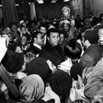 Muhammad Ali was mobbed by fans at Hynes Auditorium during his 1977 visit to Boston. (Globe Staff/File)