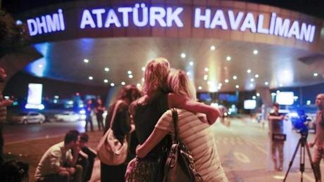 TURKEY SLIDER3 Passengers embrace each other at the entrance to Istanbul's Ataturk airport, early Wednesday, June 29, 2016 following their evacuation after a blast. Suspected Islamic State group extremists have hit the international terminal of Istanbul's Ataturk airport, killing dozens of people and wounding many others, Turkish officials said Tuesday. Turkish authorities have banned distribution of images relating to the Ataturk airport attack within Turkey. (AP Photo/Emrah Gurel) TURKEY OUT
