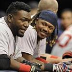 Boston Red Sox' David Ortiz, left, and Hanley Ramirez talk in the dugout during a baseball game against the Tampa Bay RaysTuesday, June 28, 2016, in St. Petersburg, Fla. (AP Photo/Steve Nesius)