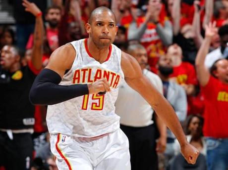 ATLANTA, GA - MAY 06: Al Horford #15 of the Atlanta Hawks reacts after hitting a three-point basket against the Cleveland Cavaliers in Game Three of the Eastern Conference Semifinals during the 2016 NBA Playoffs at Philips Arena on May 6, 2016 in Atlanta, Georgia. NOTE TO USER User expressly acknowledges and agrees that, by downloading and or using this photograph, user is consenting to the terms and conditions of the Getty Images License Agreement. (Photo by Kevin C. Cox/Getty Images)
