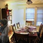 CAMBRIDGE, MA - 6/23/2016: Aicha Belabbes says her afternoon prayer before breaking the daily Ramadan fast with her family at her home in Cambridge on Thursday, June 23, 2016. Fasting during Ramadan is more difficult this year because the month falls around the summer solstice, when daylight lasts longest during the year. (Timothy Tai for The Boston Globe)