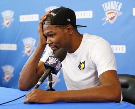 Oklahoma City's Kevin Durant (35) speaks during a news conference at the team's practice facility in Oklahoma City, Wednesday, June 1, 2016. Durant, the face of the Oklahoma City franchise since its move from Seattle in 2008 is heading into free agency, and what he chooses to do could shake up the NBA landscape. Durant said Wednesday that he has not yet 