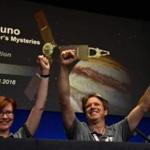 Diane Brown (L), NASA Juno program executive, Scott Bolton (C), Juno principal investigator and Rick Nybakken, Juno project manager, celebrate at a press conference after the Juno spacecraft was successfully placed into Jupiter's orbit, at the Jet Propulsion Laboratory in Pasadena, California on July 4, 2016. Juno was launched from Cape Canaveral in Florida on August 5, 2011 on a five-year voyage to its mission to study the planet's formation, evolution and structure. / AFP PHOTO / Robyn BECKROBYN BECK/AFP/Getty Images