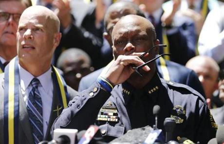Dallas Police Chief David Brown reacted while speaking about the police officers killed.
