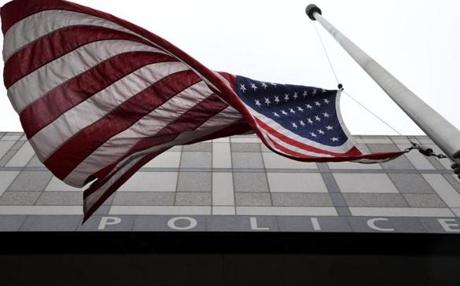 The flag outside Boston police Department in Boston was lowered to half-staff. 
