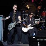 Johnny Depp and Joe Perry of Hollywood Vampires perform at Ford Amphitheater on the Coney Island Boardwalk Sunday prior to Perry?s collapse.