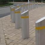 Barriers similar to these will be installed along a section of Washington Street in West Newton.