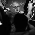 Woody Allen faces the press at the Cannes Film Festival in May.