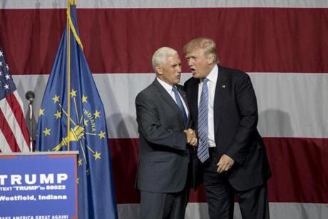 WESTFIELD, IN - JULY 12: Republican presidential candidate Donald Trump greets Indiana Gov. Mike Pence at the Grand Park Events Center on July 12, 2016 in Westfield, IN. Trump is campaigning amid speculation he may select Indiana Gov. Mike Pence as his running mate. (Photo by Aaron P. Bernstein/Getty Images)
