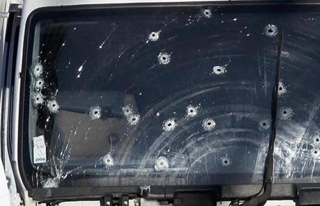 FRANCE SLIDER2 Bullet impacts are seen on the heavy truck the day after it ran into a crowd at high speed killing scores celebrating the Bastille Day July 14 national holiday on the Promenade des Anglais in Nice, France, July 15, 2016. REUTERS/Eric Gaillard

