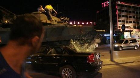 A Turkish tank plowed over a vehicle in Ankara, Turkey.
