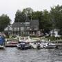 Boats sit docked in Wolfeboro Bay in Wolfeboro, N.H. The town is where former Republican Presidential candidate Mitt Romney will spend the week in lieu of going to the Republican National Convention in Cleveland. 