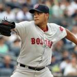 Jul 16, 2016; Bronx, NY, USA; Boston Red Sox starting pitcher Eduardo Rodriguez (52) pitches during the first inning against the New York Yankees at Yankee Stadium. Mandatory Credit: Anthony Gruppuso-USA TODAY Sports 