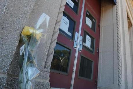  Yellow rose set up by entrance to Curley Community Center L Street entrance which remains closed where 7 yr old Kyzr Willis was found dead at Carson Beach Globe photo David Ryan
