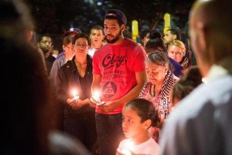 Jonathan Ramos attended a 2013 candlelight vigil for his cousin Jorge Fuentes held by St. Stephen's Episcopal Church.
