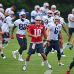 Foxborough-07/29/2016-The New England Patriots held their 2nd day of training camp at the practice fields of Gillette Stadium. Qb Jimmy Garoppolo leads the team in warmups. Boston Globe staff photo by John Tlumacki(sports)