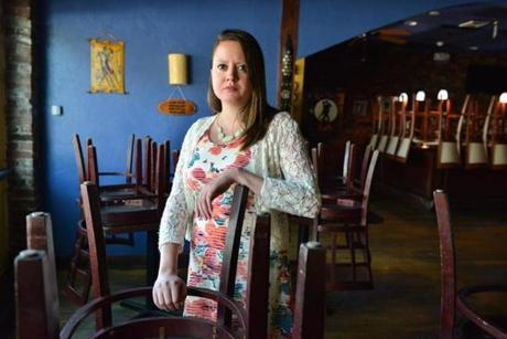 Alissa Mermet manages Tango, an Argentinian restaurant in Arlington Center. She?s afraid her restaurant will have to close because of rising rents.
