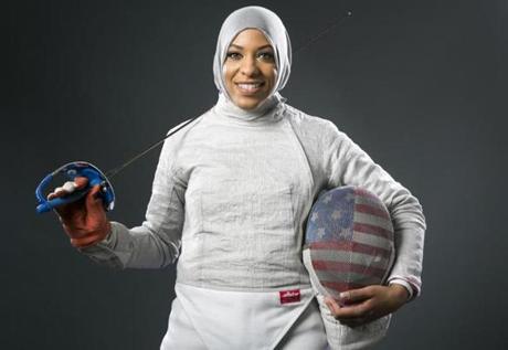 Fencer Ibtihaj Muhammad poses for photos at the 2016 Team USA Media Summit Wednesday, March 9, 2016, in Beverly Hills, Calif. (AP Photo/Damian Dovarganes)
